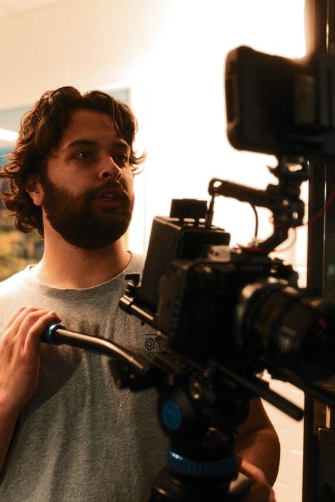 Camera operator lining up a shot